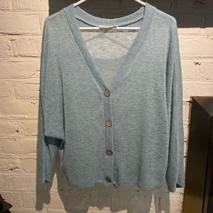 Gauze light weight button boutique sweater in robins egg blue/green.